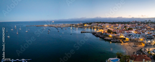 Aerial panoramic sunset view of Cascais. 30km west of Lisbon on the portuguese riveira, cascais, Portugal. Aerial view of Praia da Rainha and historic city centre of Cascais, Portugal photo