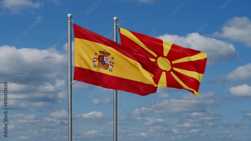 Spain and North Macedonia flags flying together, video concept of the relationship Spain and North Macedonia flags flying together, video concept of the relationship