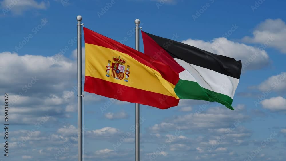 Palestine and Gaza Strip and Spain two flags waving together on blue sky, looped video Palestine and Gaza Strip and Spain two flags waving together on blue sky, looped video