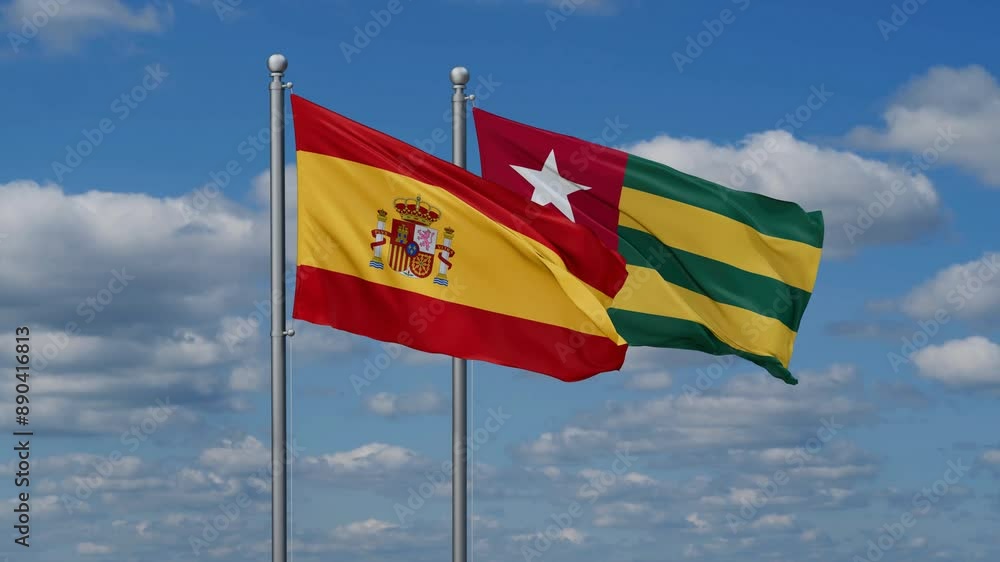 Togo, Togolese Republic and Spain flags flying together, video concept of the relationship, two country cooperation concept Togo, Togolese Republic and Spain flags flying together, video concept of the relationship, two country cooperation concept