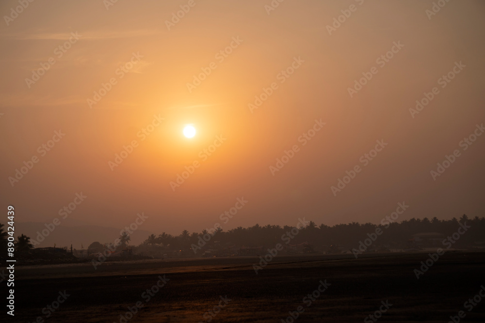The setting sun at Murud beach. Murud is located 60 kms south of Alibag on the west coast of India. The setting sun at Murud beach. Murud is located 60 kms south of Alibag on the west coast of India.