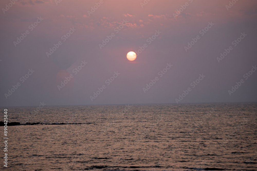The setting sun at Murud beach. Murud is located 60 kms south of Alibag on the west coast of India. The setting sun at Murud beach. Murud is located 60 kms south of Alibag on the west coast of India.