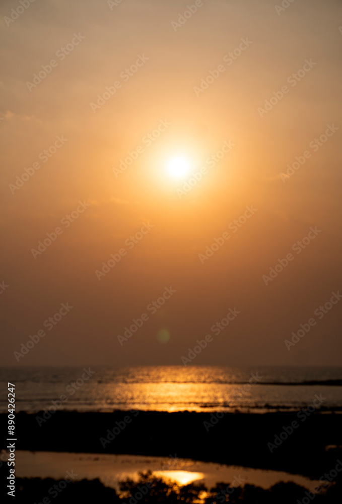 The setting sun at Murud beach. Murud is located 60 kms south of Alibag on the west coast of India. The setting sun at Murud beach. Murud is located 60 kms south of Alibag on the west coast of India.