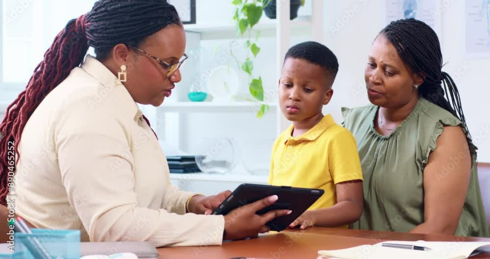 Pediatrician Having Consultation With Boy And His Mother Pediatrician Having Consultation With Boy And His Mother