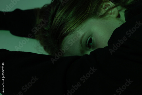Portrait of a 10 year old girl. A serious portrait of a teenager, a vivid portrait of a growing teenager
