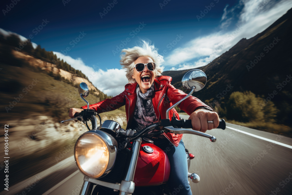 An elderly woman enjoying the ride on a motorcycle. An elderly woman enjoying the ride on a motorcycle.