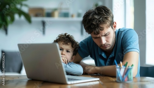 A person working at a laptop with a child tugging at their arm, both looking frustrated