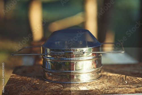 Rural and natural beekeeper, working to collect honey from hives