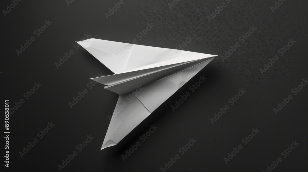 Minimalist and Playful White Paper Airplane on Clean Background Minimalist and Playful White Paper Airplane on Clean Background