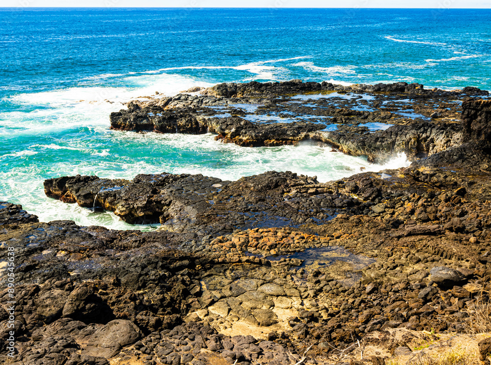 The Rough Lava Shoreline at Spouting Horn Beach Park, Kauai, Hawaii, USA