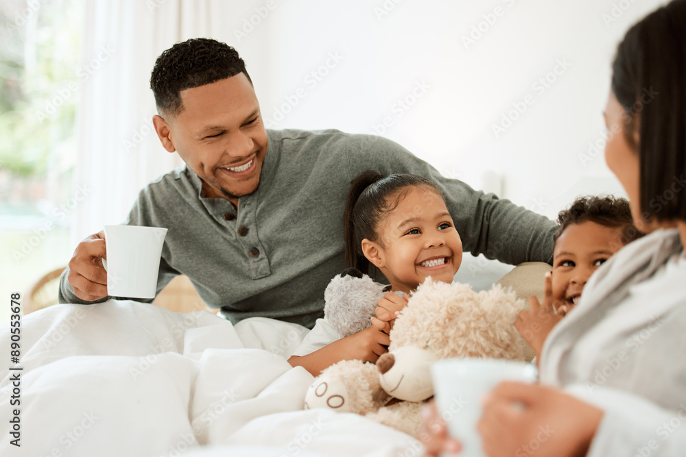 Happy family, coffee and morning with children in bed awake for bonding or playful weekend at home. Mother, father and young kids with smile for holiday, relax or break together in bedroom at house Happy family, coffee and morning with children in bed awake for bonding or playful weekend at home. Mother, father and young kids with smile for holiday, relax or break together in bedroom at house