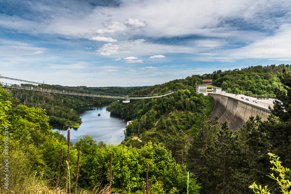 Rappbodetalsperre and the almost 500 m long suspension bridge in the German Harz mountains. Rappbodetalsperre and the almost 500 m long suspension bridge in the German Harz mountains.