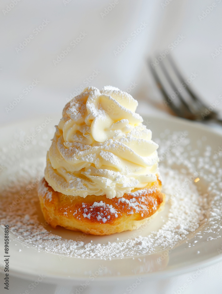 Delicious Cream Puff Pastry with Whipped Cream and Powdered Sugar on a White Plate Delicious Cream Puff Pastry with Whipped Cream and Powdered Sugar on a White Plate