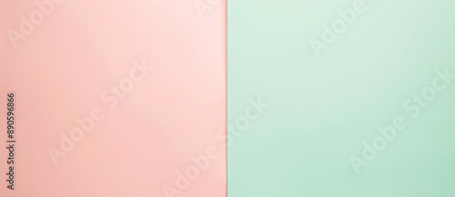 Abstract background featuring a solid color surface split evenly into contrasting pastel pink and green, ideal for minimalist designs