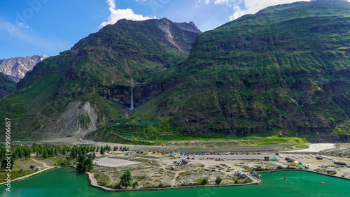 landscape of stunning waterfall in the picturesque village of Sisu photo