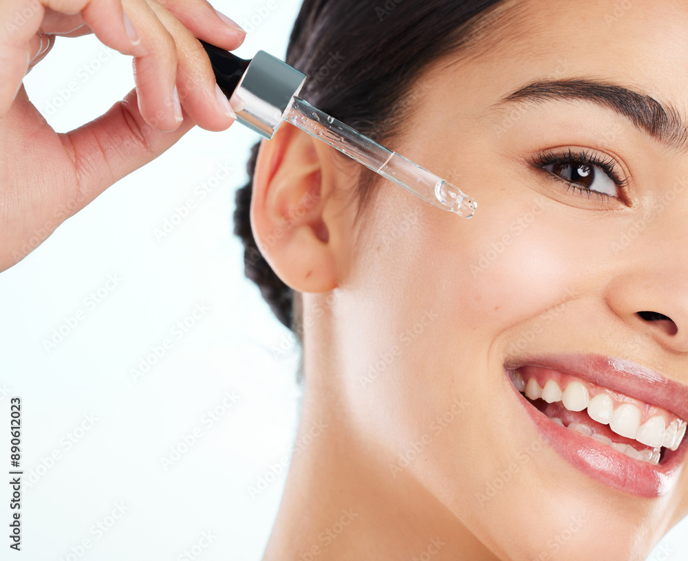 Beauty, dropper and portrait of woman in studio for antiaging cosmetics or dermatology. Face, skincare or smile and happy model with liquid serum for collagen, hydration or vitamin c treatment Beauty, dropper and portrait of woman in studio for antiaging cosmetics or dermatology. Face, skincare or smile and happy model with liquid serum for collagen, hydration or vitamin c treatment