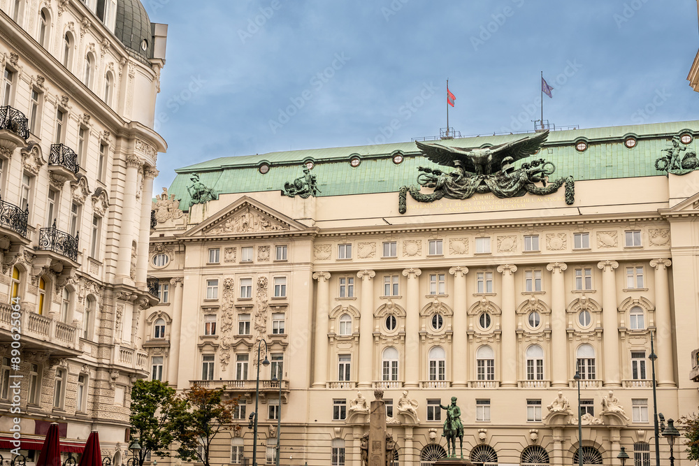 Obraz premium Vienna, Austria, August 21, 2022. Nice shot with the facade showing the large eagle of the former Imperial and Royal Ministry of War, now home to several federal ministries. No people.
