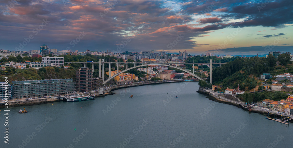 Obraz premium Aerial view of the European city Porto with Luis I Bridge over Douro river in Portugal, aerial view. Panoramic aerial view of Dom Luis Bridge in Porto