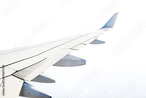 Airplane Wing Against a White Sky