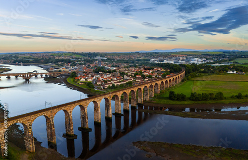 Berwick, Northumberland, UK, June 19, 2024; sunset aerial view of the Royal Border Bridge Viaduct, Berwick, Berwick-upon-Tweed, Northumberland, England, UK. photo