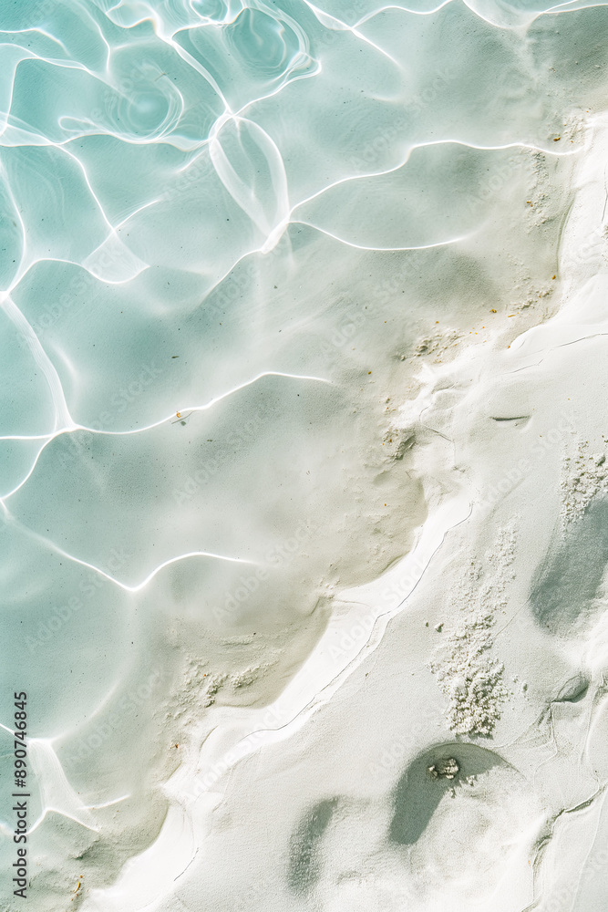 Naklejka premium Top view of beach background with white sand and water, aerial view, minimalist style with copy space. 