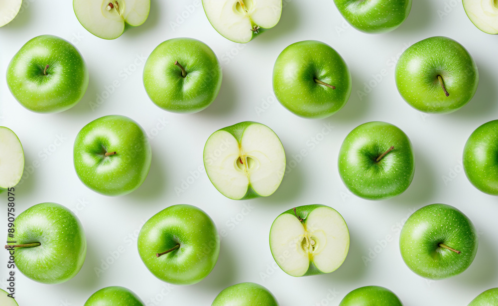 Pattern of whole and halved green apples on a light background. Pattern of whole and halved green apples on a light background.