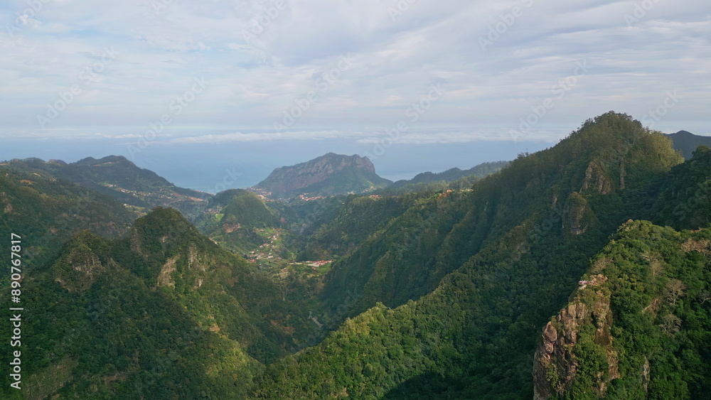 Fototapeta premium Green valleys majestic mountains drone view. Scenic landscape dense forests