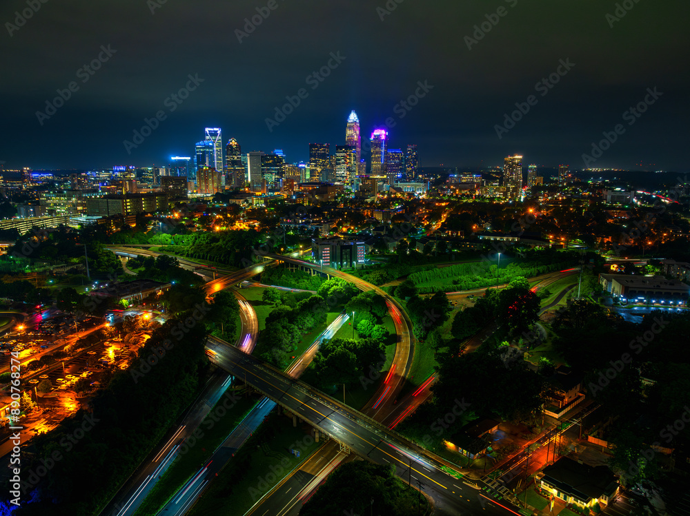 Fototapeta premium Aerial view of Charlotte at night with highways