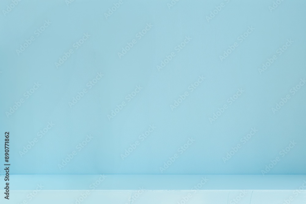 Light blue wall background with a smooth and even texture.