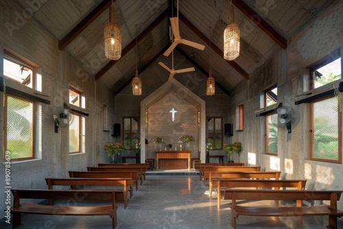 A large, open church with wooden pews and a cross on the wall. The space is filled with light and the atmosphere is peaceful
