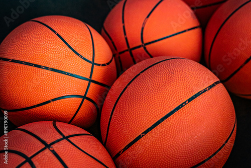 close up of orange basketballs in a bunch