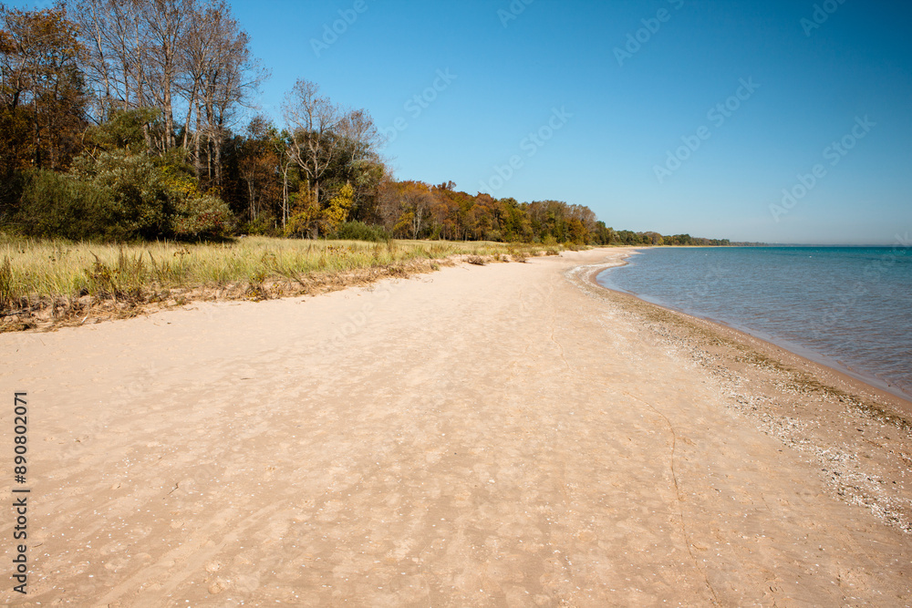 Looking north along the Lake Michigan beach at Harrington Beach State Park, Belgium, Wisconsin on a peaceful, calm, mid-autumn morning. Looking north along the Lake Michigan beach at Harrington Beach State Park, Belgium, Wisconsin on a peaceful, calm, mid-autumn morning.