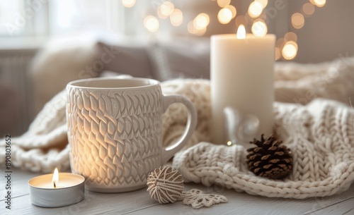 Cozy Winter Scene With Mug, Candles, and Knit Blanket