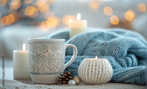Cozy Winter Scene With Mug, Candles, and Knit Blanket