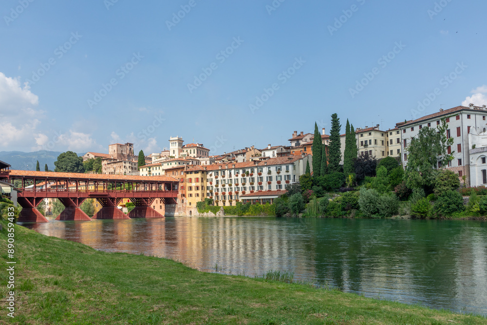 Fototapeta premium view to historic skyline of Bassano del Grappa with the Old wooden Bridge, also called ponte degli Alpini, Italy