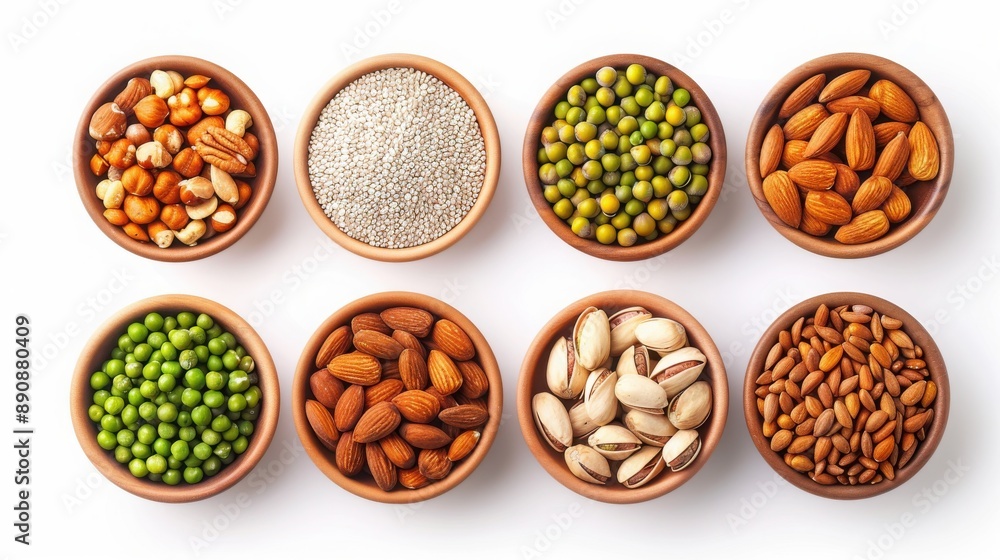 Assorted nuts and seeds in bowls, including almonds, pistachios, and legumes, displayed on a white background. Assorted nuts and seeds in bowls, including almonds, pistachios, and legumes, displayed on a white background.