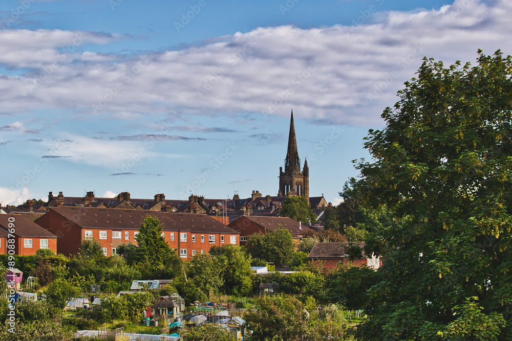 Fototapeta premium Small town with church steeple and residential buildings