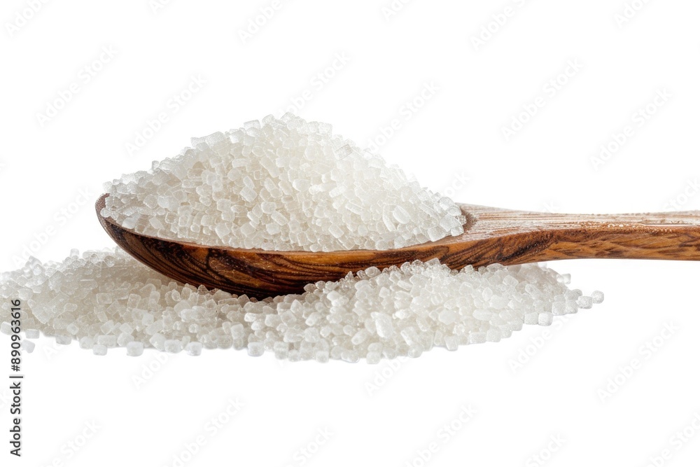 A wooden spoon filled with white sugar, useful for baking and cooking A wooden spoon filled with white sugar, useful for baking and cooking