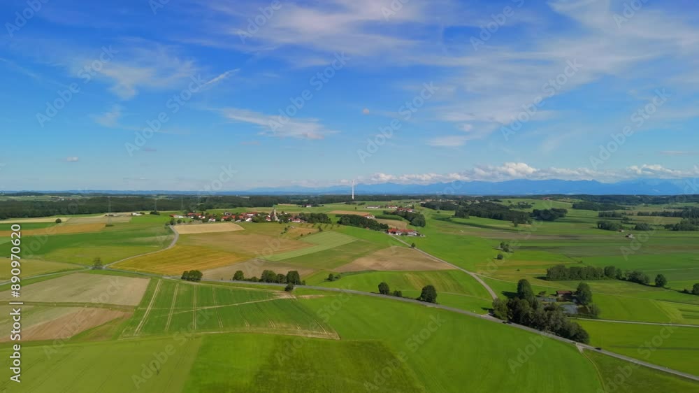 Pfarrkirche St. Michael, Alxing und Windfarm in Bayern, Deutschland Luftaufnahme. Wind turbin behind village church aerial view. Alxing Blick uber Pfarrkirche St. Michael auf Osterklinger Windrad. Pfarrkirche St. Michael, Alxing und Windfarm in Bayern, Deutschland Luftaufnahme. Wind turbin behind village church aerial view. Alxing Blick uber Pfarrkirche St. Michael auf Osterklinger Windrad.
