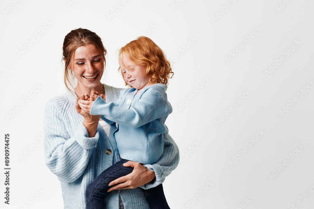 Mother and daughter embracing in front of white background, love and care concept Mother and daughter embracing in front of white background, love and care concept