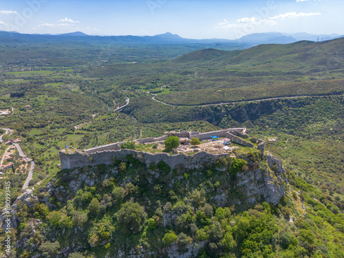 Aerial view over the picturesque village Stemnitsa and the old historical castle ruins in Arcadia, Greece photo