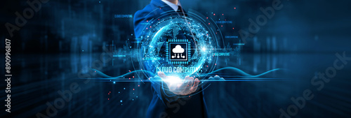 Obraz na płótnie Businessman holds cloud computing on global structure network and data storage, scalability, virtualization, and remote access.
