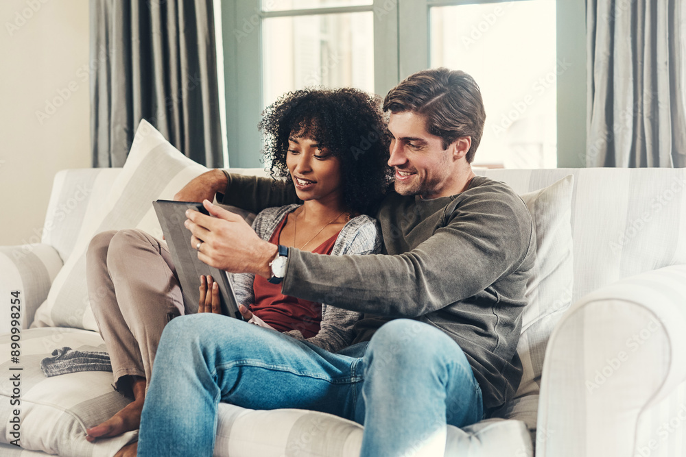 Couple, bonding and tablet with streaming, watching movie and happy in lounge, sofa and home on break. Woman, man and technology as interracial partner in together, cheerful and embrace in connection Couple, bonding and tablet with streaming, watching movie and happy in lounge, sofa and home on break. Woman, man and technology as interracial partner in together, cheerful and embrace in connection