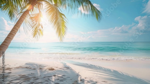 Fototapeta Naklejka Na Ścianę i Meble -  A tranquil tropical beach with soft white sand, palm tree leaves catching the sunlight, and a serene blue sky. 