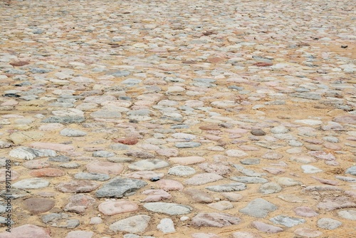 photo on old road made of stone