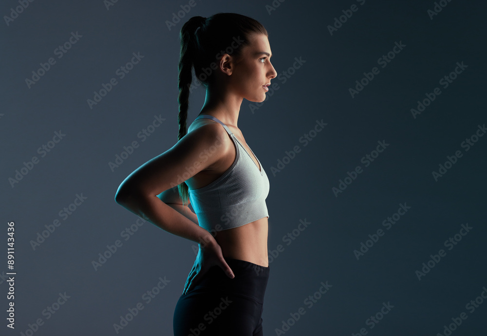 Healthy model, girl and fitness in studio with activewear for workout goals, body progress and mockup space. Athlete, person and serious with sportswear for training and exercise on gray background Healthy model, girl and fitness in studio with activewear for workout goals, body progress and mockup space. Athlete, person and serious with sportswear for training and exercise on gray background