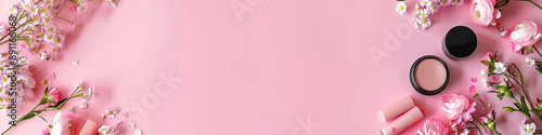 Makeup and cosmetics products set on pastel background with a copy space banner