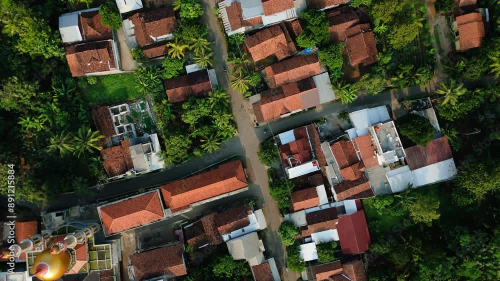 Aerial arc from top of local house village with intersection Aerial arc from top of local house village with intersection