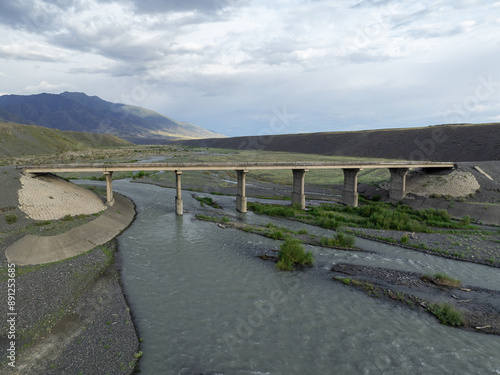 The old bridge on the River Yrgaity and Dzungarian Gate in East Kazakhstan region. photo