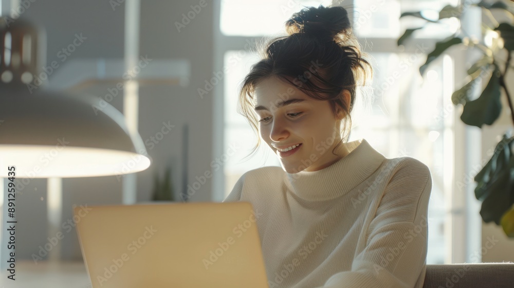 A smiling businesswoman working on a laptop in a clean, minimalistic office A smiling businesswoman working on a laptop in a clean, minimalistic office